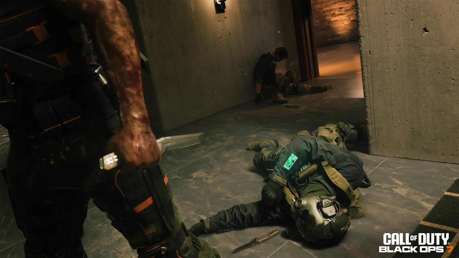 Fallen armored soldiers lie in a mansion hallway as a survivor hides near a doorway.