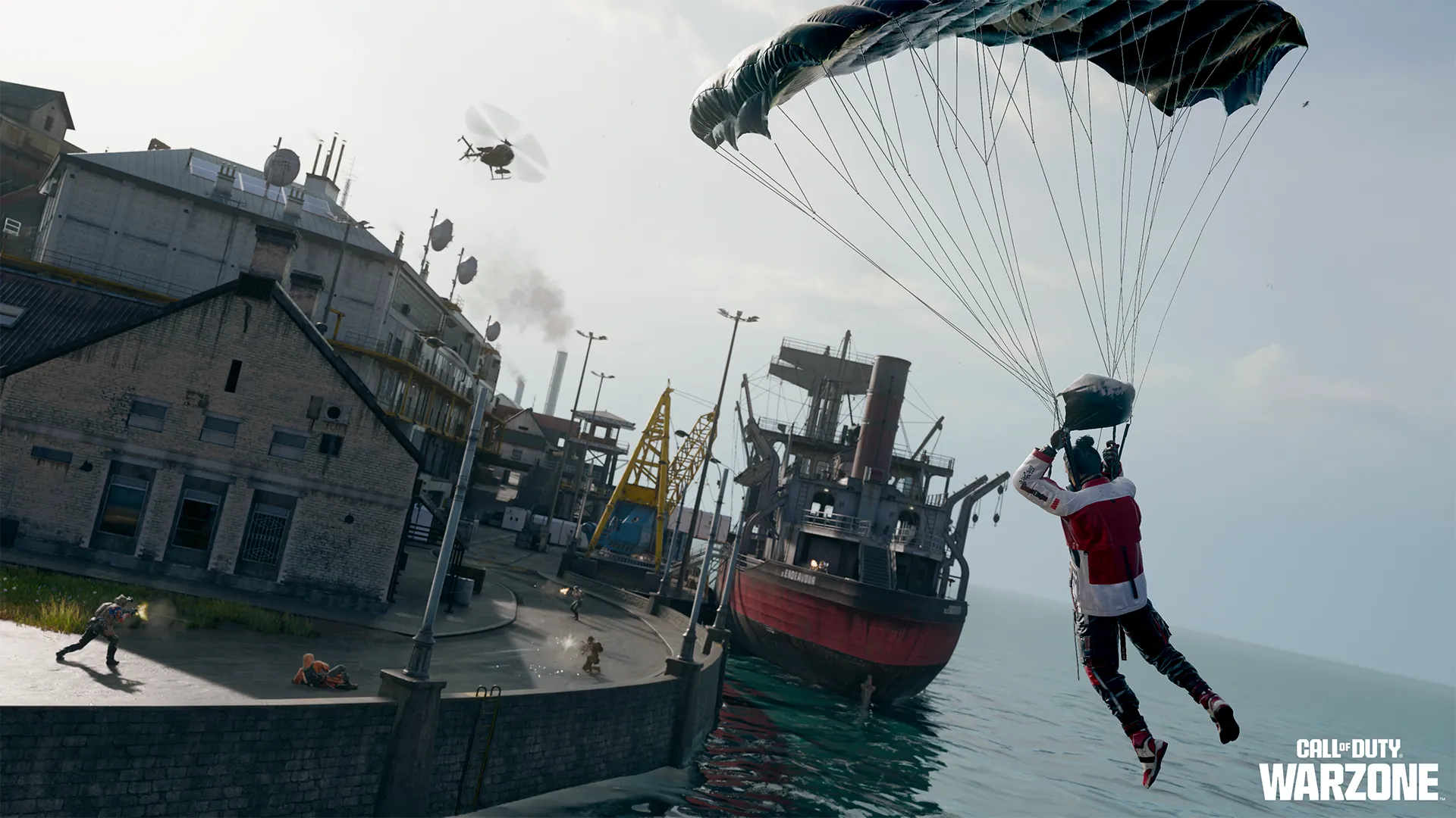 A parachuting operator approaches an industrial harbor with a docked ship as fighting continues below.