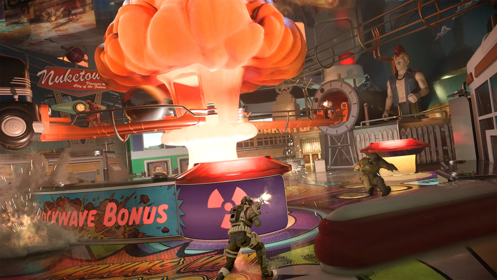 Players battle around a giant mushroom cloud centerpiece inside the Turbo Tilt pinball arena.