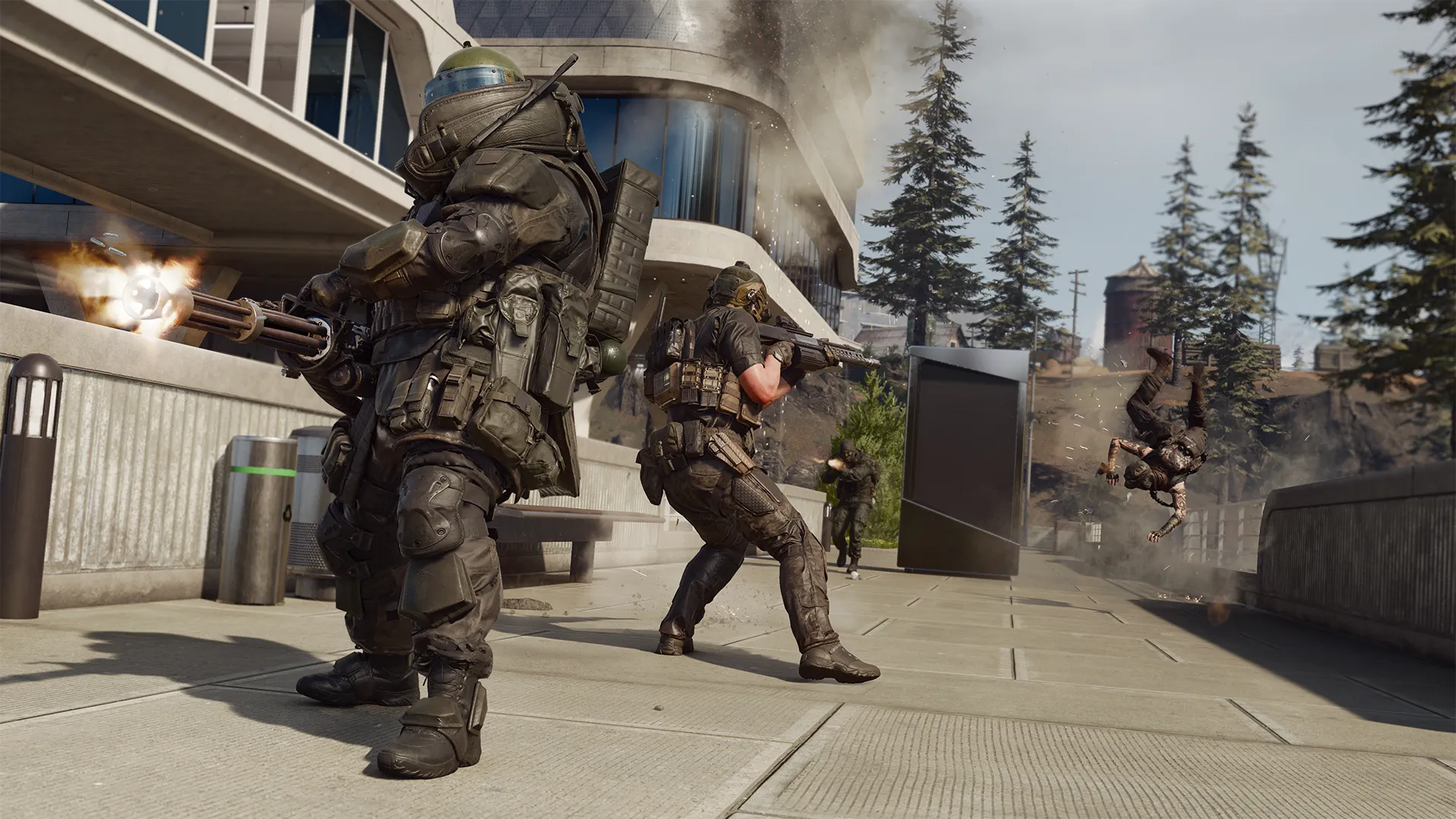 Heavily armored soldiers exchange fire outside Drone Labs as an explosion throws an enemy into the air.