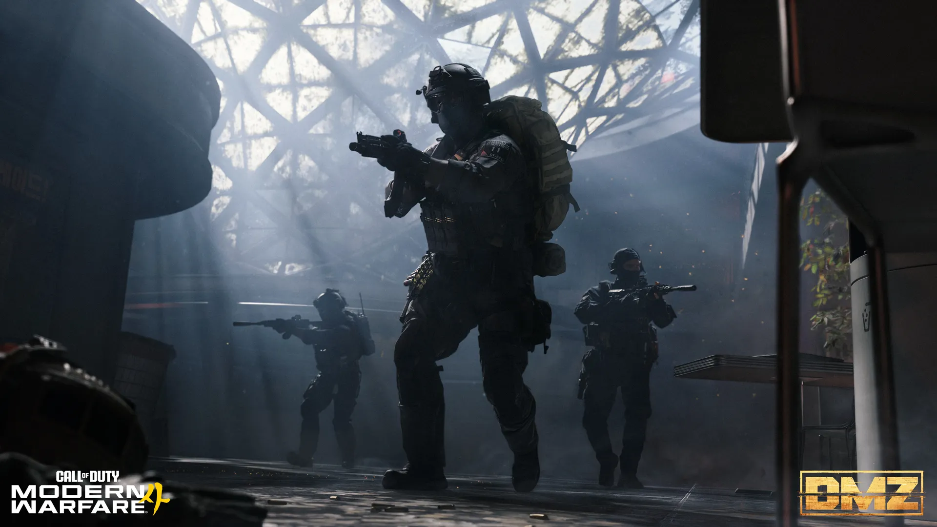 Three soldiers sweep through a damaged building illuminated by shafts of sunlight.