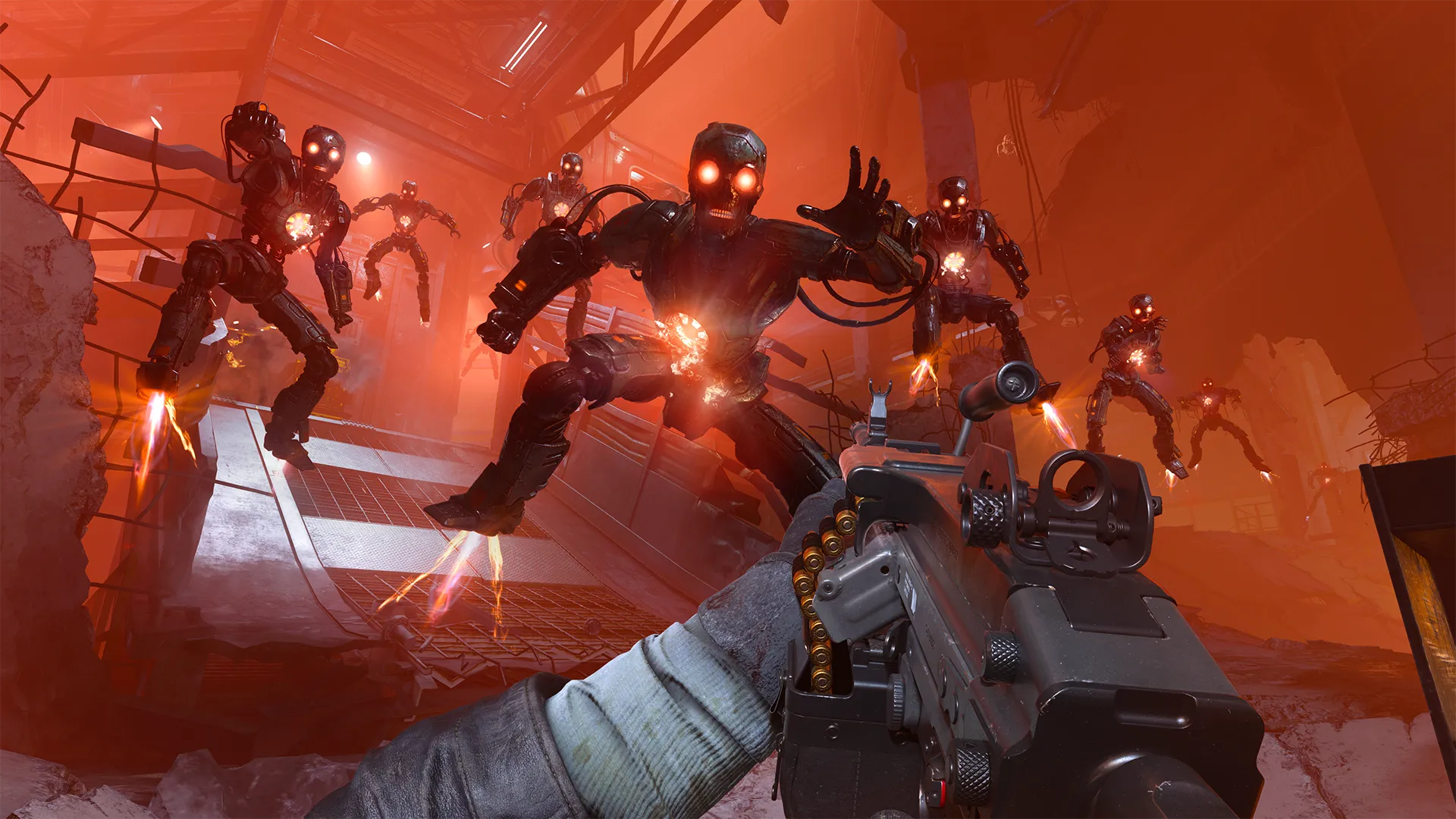 A first-person perspective shows a player aiming a weapon at a swarm of flying, red-eyed robots with jet-powered legs, as they charge through a fiery, industrial ruin.